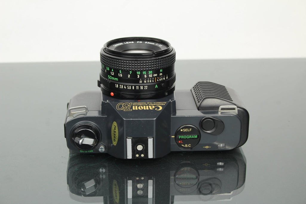 Canon T50 + 50mm 1.8 FD lens - Dutch|Thrift