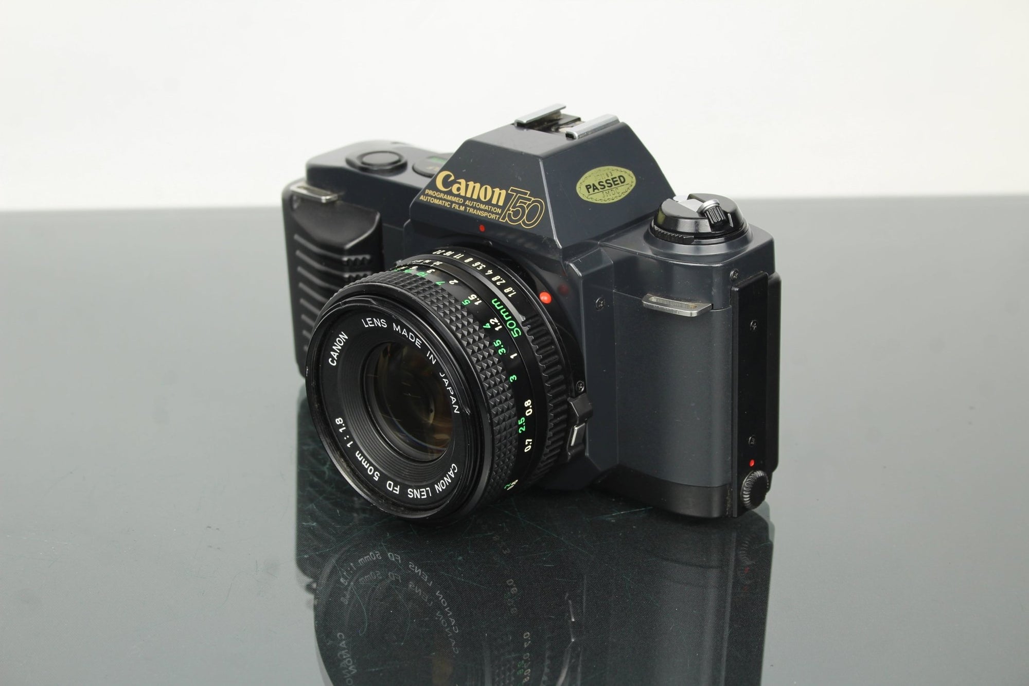 Canon T50 + 50mm 1.8 FD lens - Dutch|Thrift