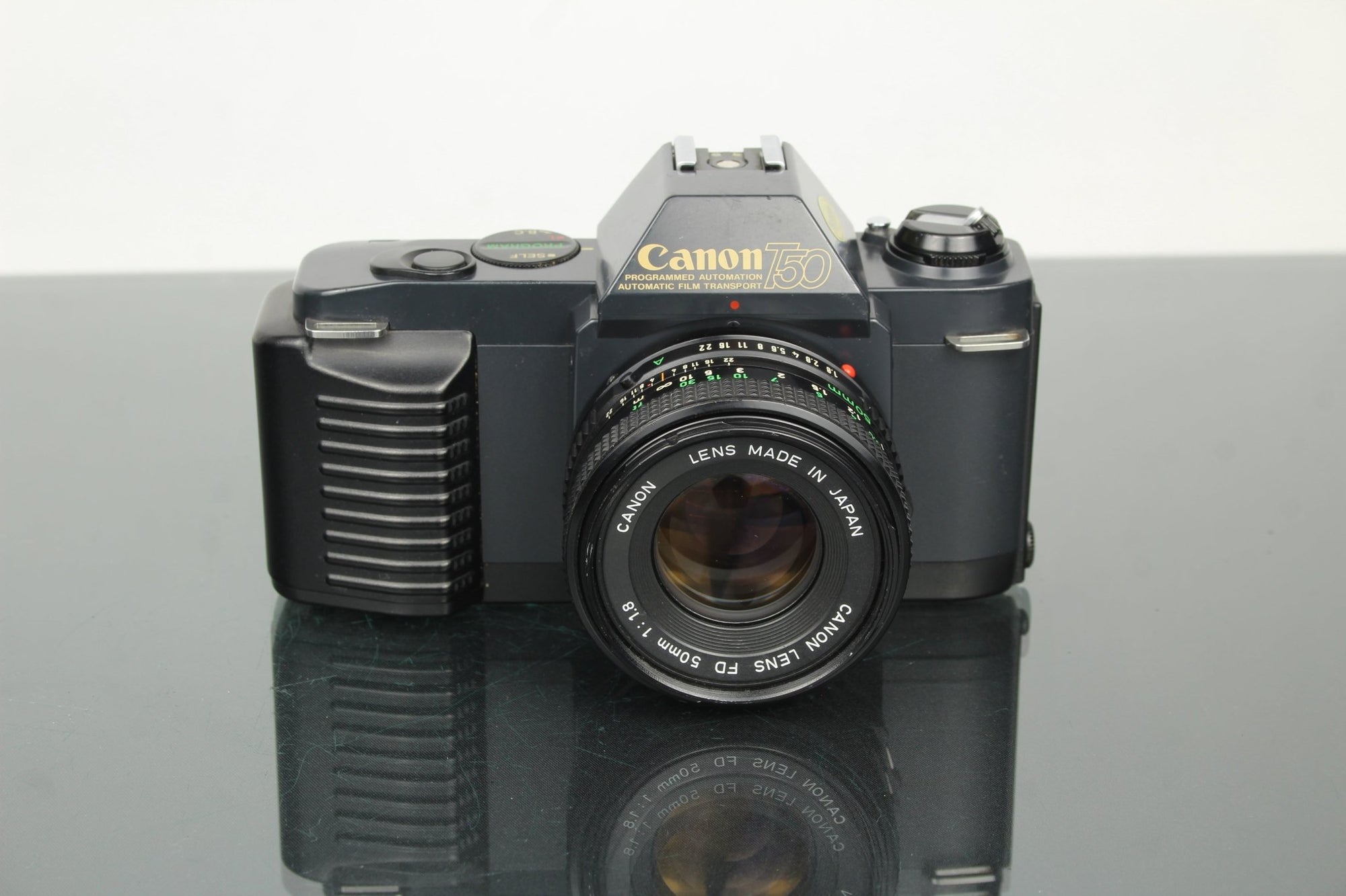 Canon T50 + 50mm 1.8 FD lens - Dutch|Thrift