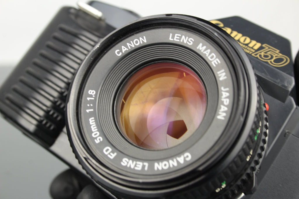 Canon T50 + 50mm 1.8 FD lens - Dutch|Thrift